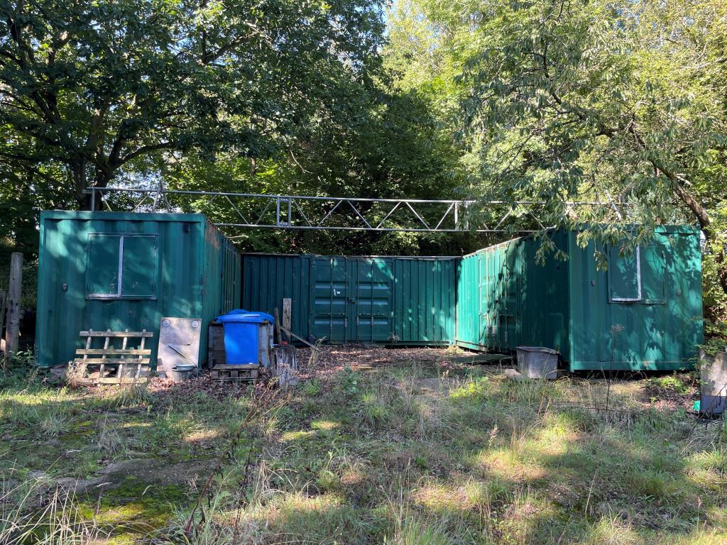 Lot: 116 - FREEHOLD LAND WITH POTENTIAL - Storage containers on front section of site